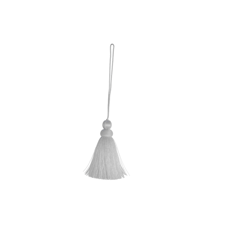White key tassel hanging from a string on a white background