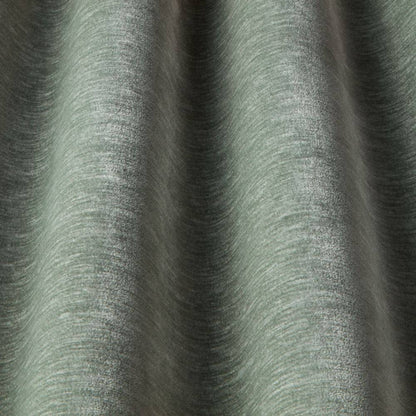 Luxe Contract Chenille Eau De Nil fabric in soft green with textured finish, ideal for durable, stain-resistant upholstery applications.
