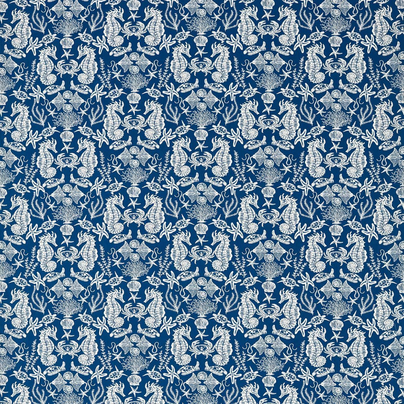 Maris Navy sea life kids fabric features intricate white marine creatures on deep blue cotton, ideal for curtains and upholstery.