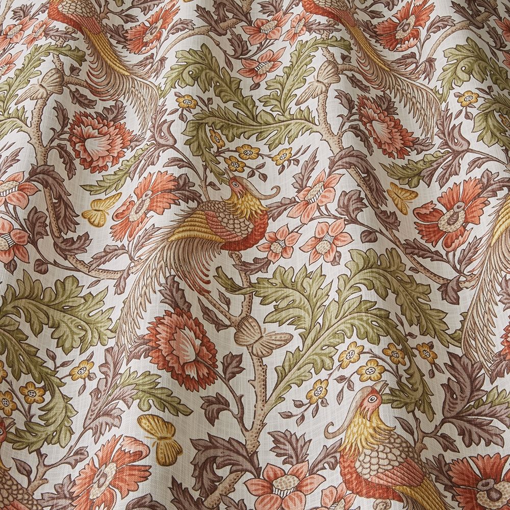 Close-up of Opus Floral Henna cotton fabric showcasing detailed floral and bird motifs in warm tones, perfect for drapes and creative textile projects.