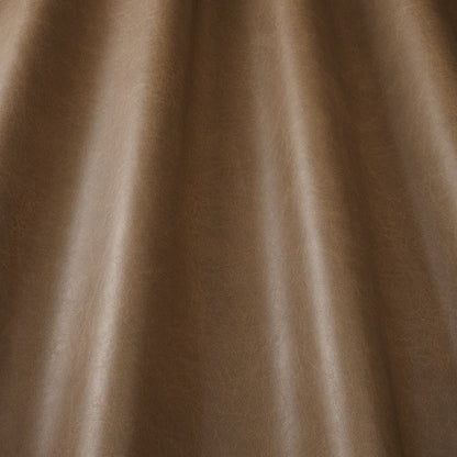 Pommel Chamoisee waterproof leather-look vinyl with a smooth brown finish and subtle sheen, perfect for high-traffic upholstery use.