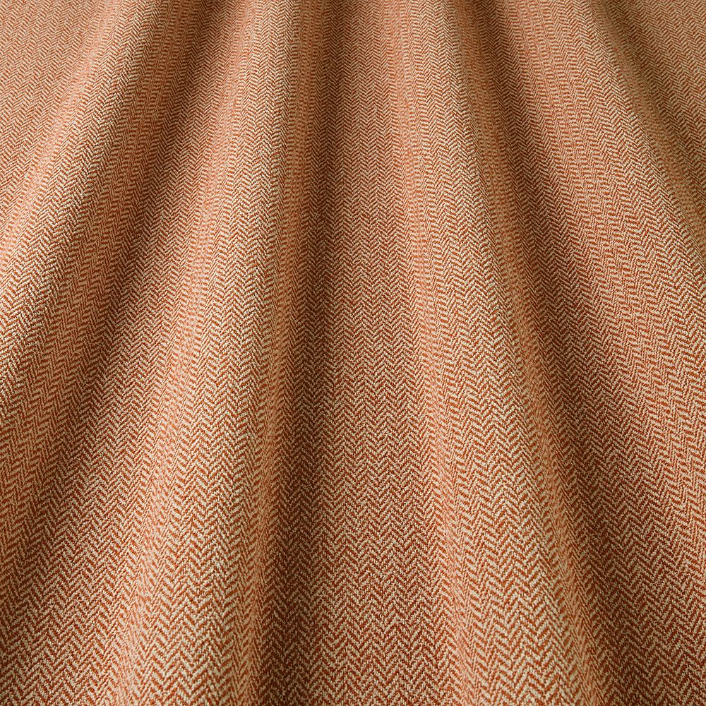 Close-up of brown fabric with a subtle pattern