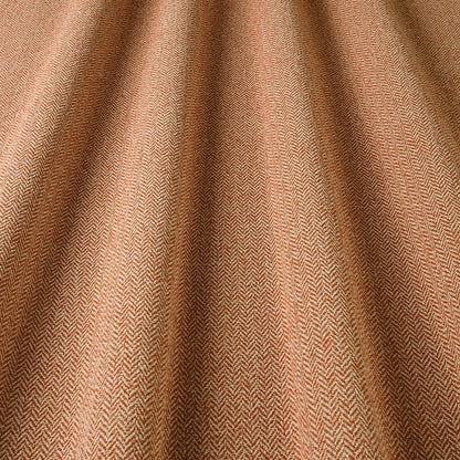 Close-up of brown fabric with a subtle pattern
