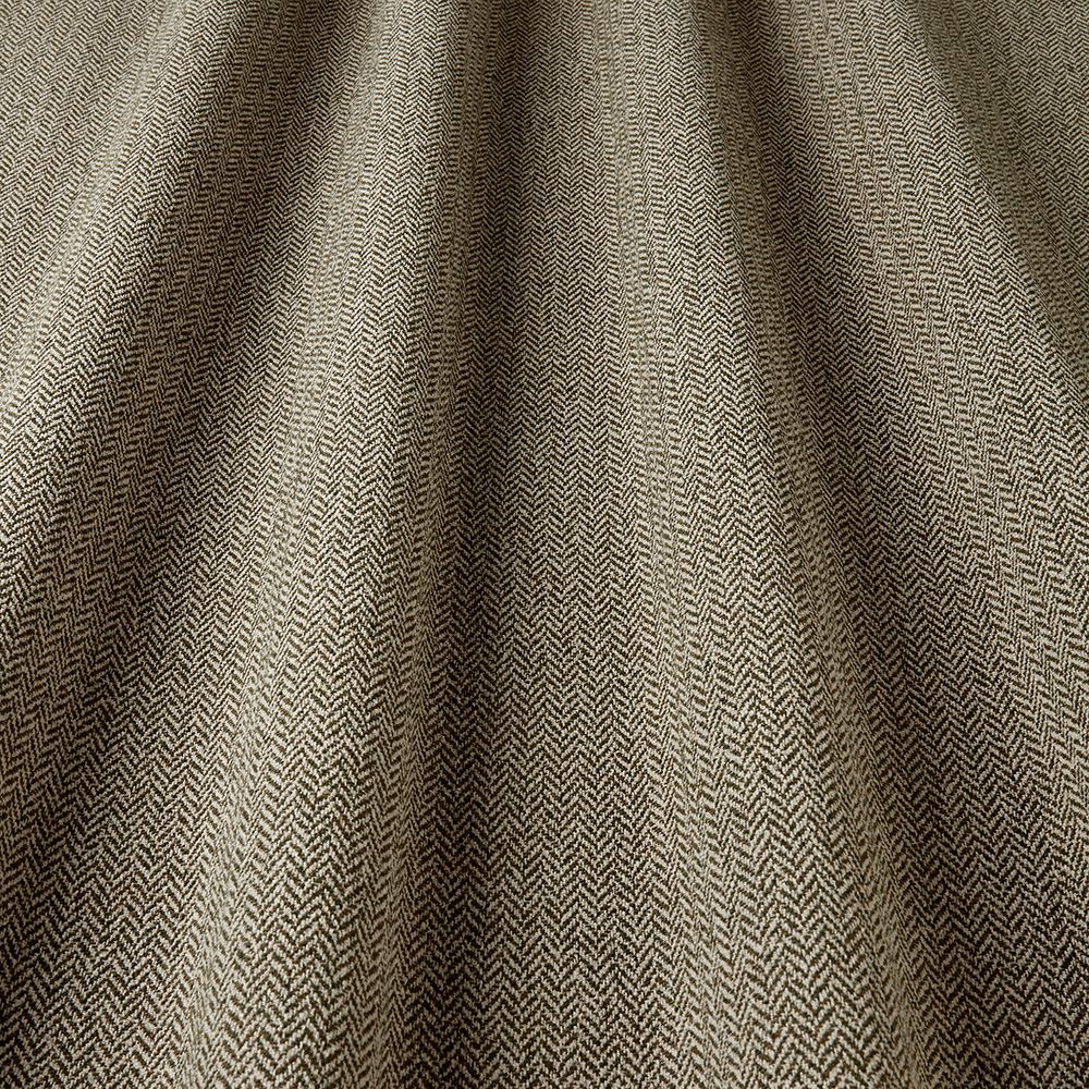 Textured fabric with a herringbone pattern in brown tones