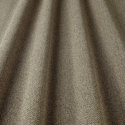 Textured fabric with a herringbone pattern in brown tones
