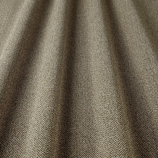 Textured fabric with a herringbone pattern in brown tones