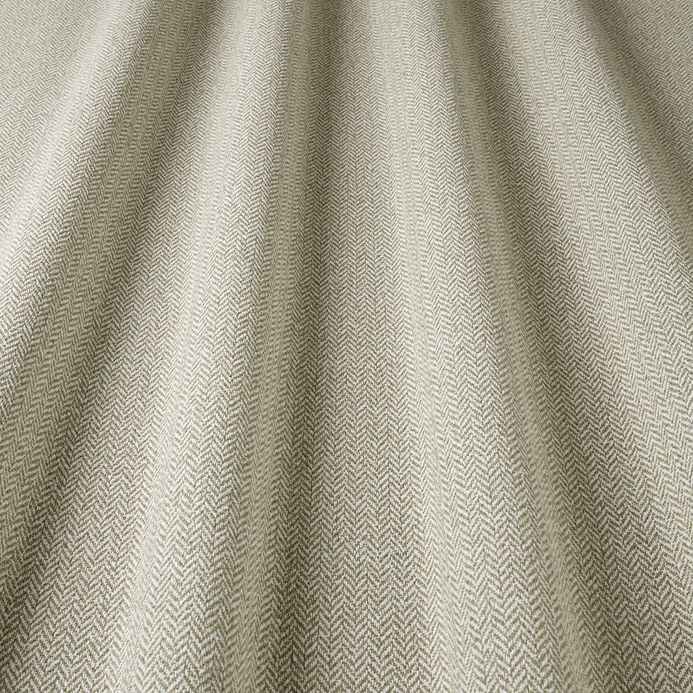 Close-up of textured beige fabric with a subtle pattern