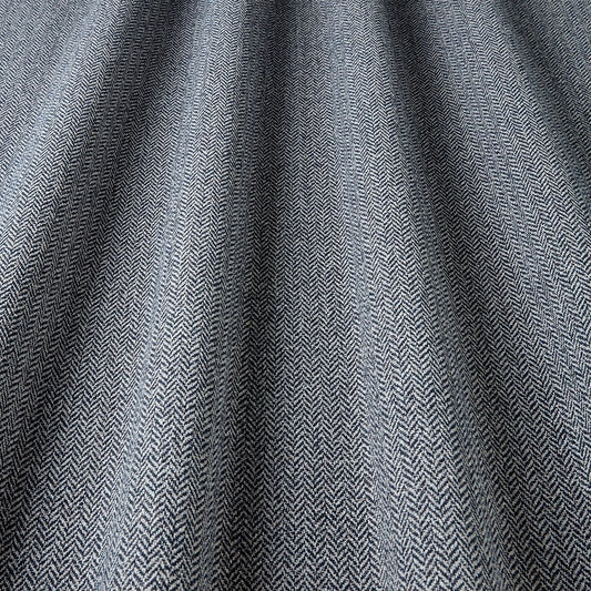 Close-up of gray fabric with a subtle pattern