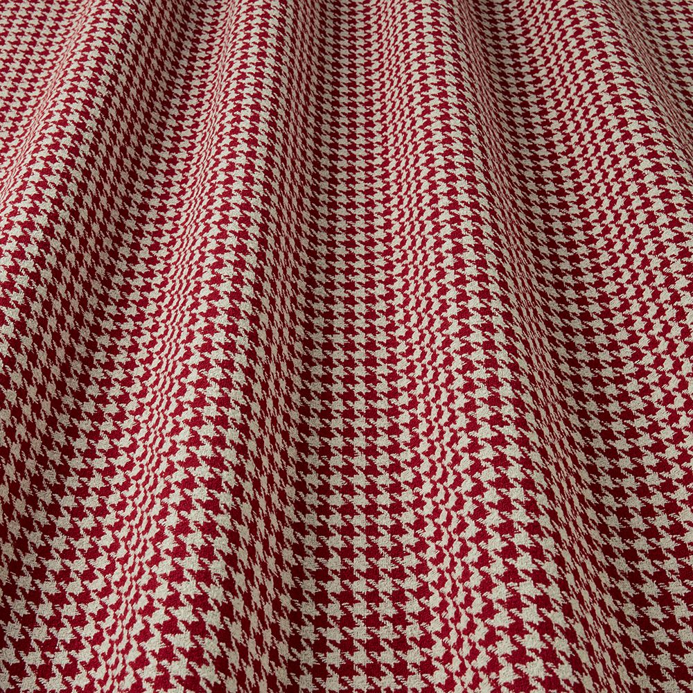 Close-up of red and white houndstooth pattern fabric