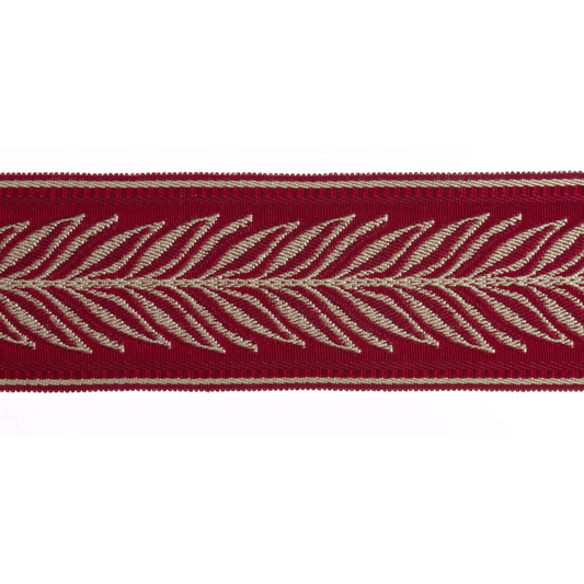 Red flat braid trim with beige leaf pattern on a white background