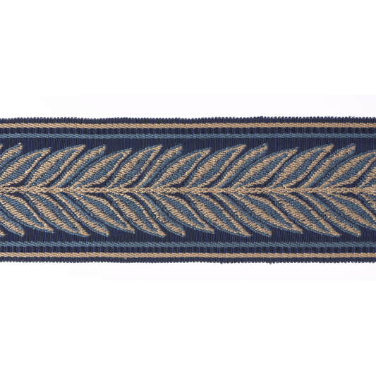 Navy blue flat braid trim with gold leaf pattern on a white background