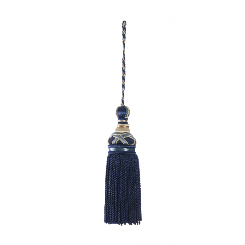 Decorative key tassel with a blue fringe and gold accents on a white background
