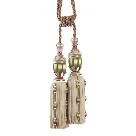 Decorative tassel with gold and beige elements on a white background