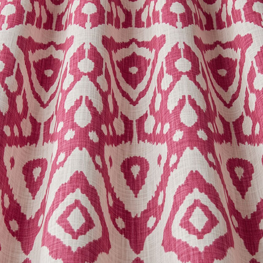 Safi Moroccan Ikat fabric in fuchsia with a geometric two-tone design, ideal for eco-friendly upholstery and home décor projects.