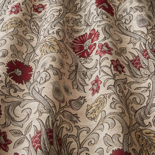 Saint Giles Ruby floral curtain fabric with intricate arts and crafts style patterns in red, yellow, and natural tones, ideal for home décor.