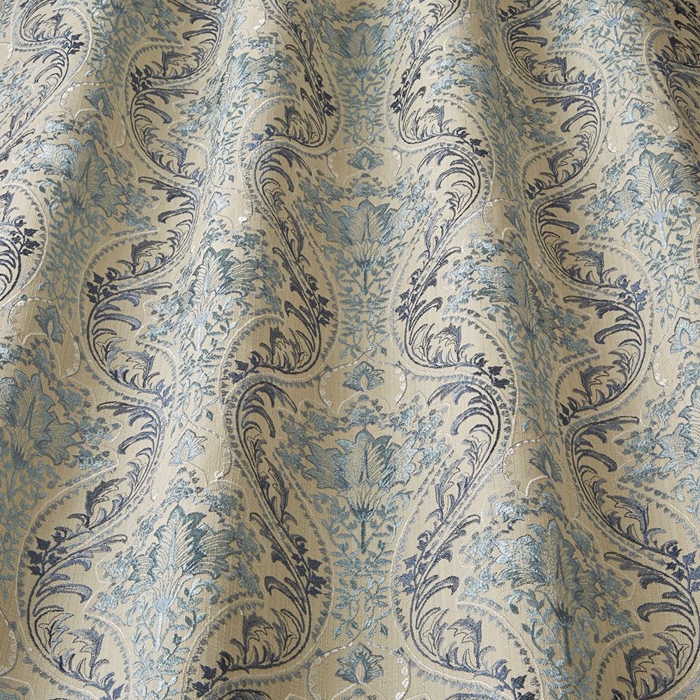 Close-up of Sonrel Floral Indigo fabric showcasing detailed art nouveau floral embroidery with a textured finish, perfect for elegant curtains.