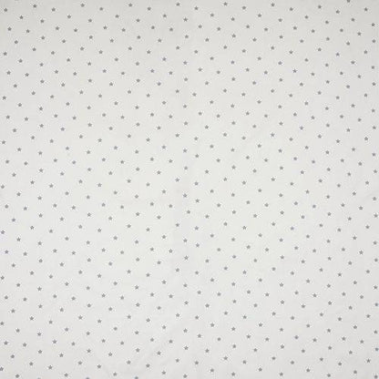Stardust Grey ivory cotton fabric with small grey stars, ideal for children's curtains, bedding, and upholstery in playful interiors.