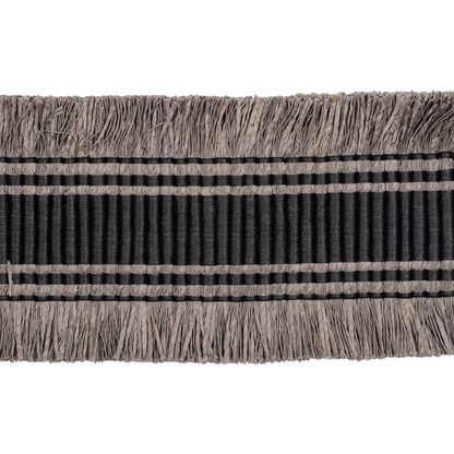 Textile strip with fringes on a white background