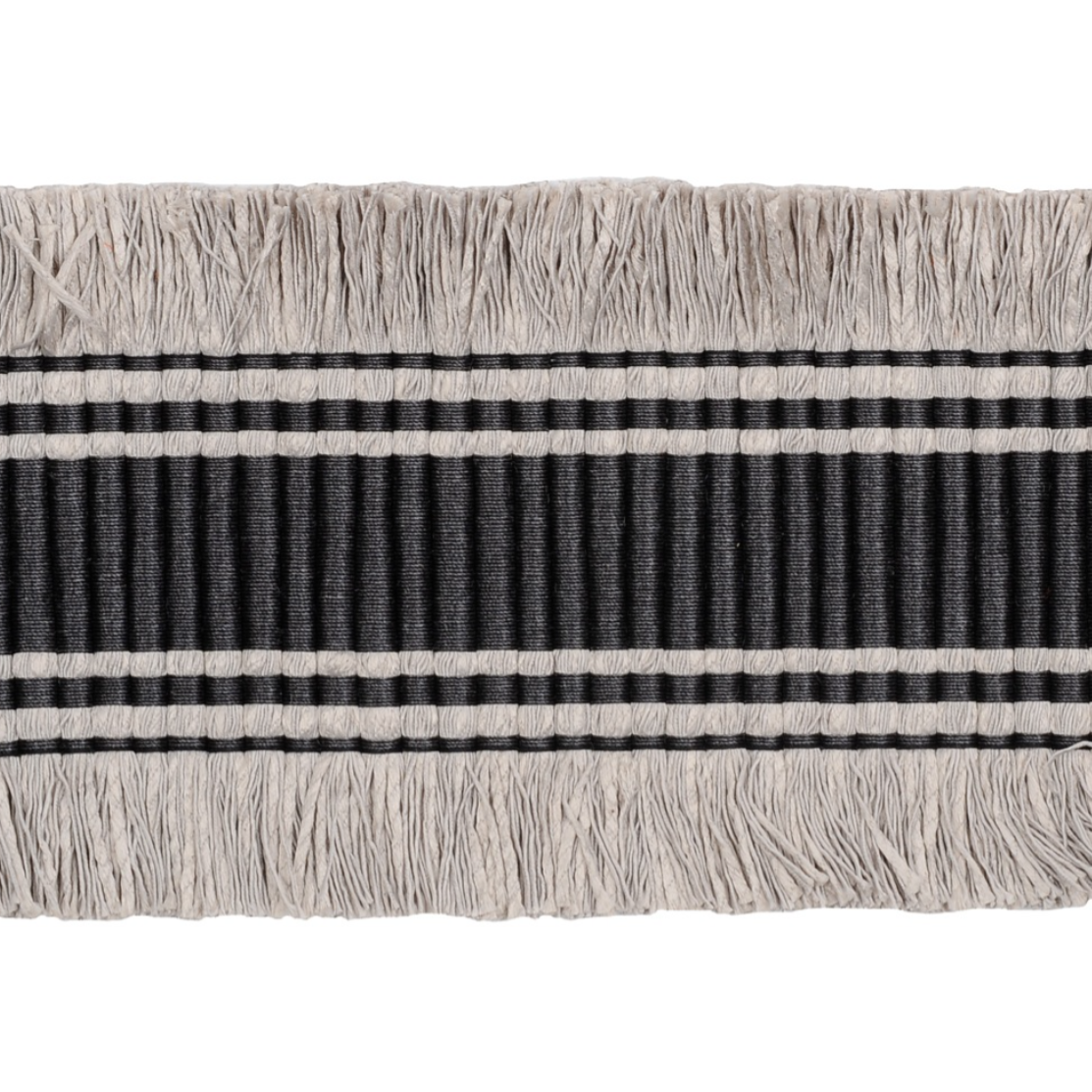 Textile with black and white striped pattern and fringes on a white background
