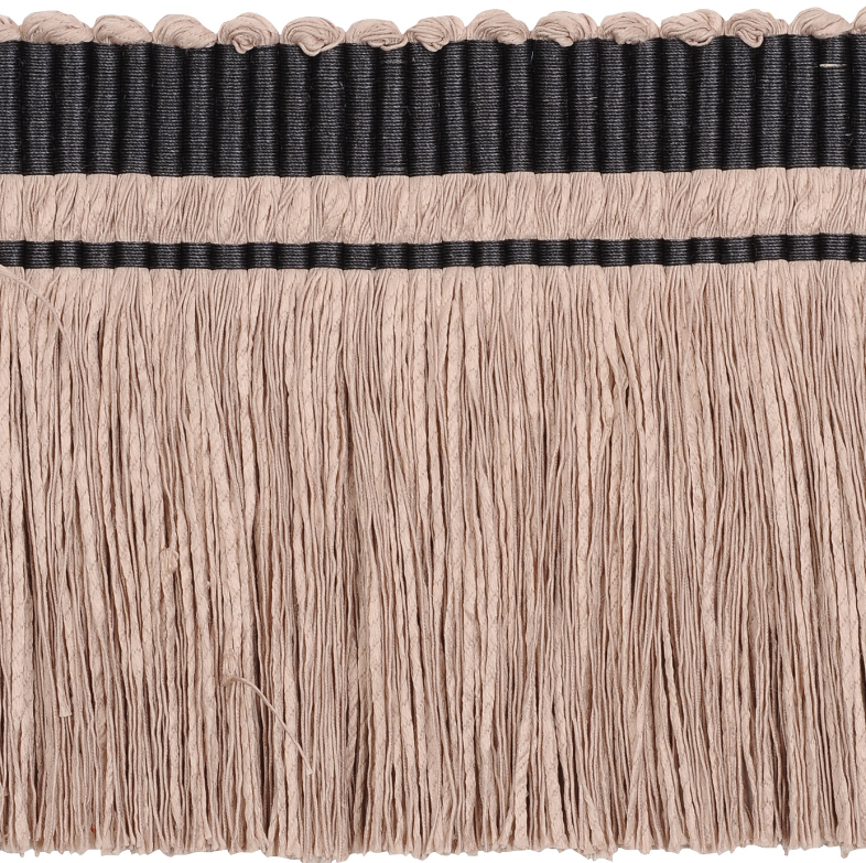 Close-up of beige fringe with a black band on a white background