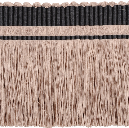 Close-up of beige fringe with a black band on a white background