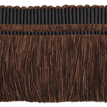 Close-up of brown fringe trim on a white background
