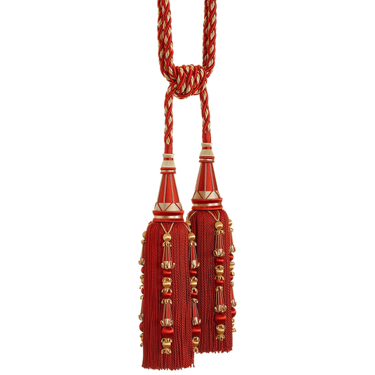 Red tassel tieback with gold accents on a white background