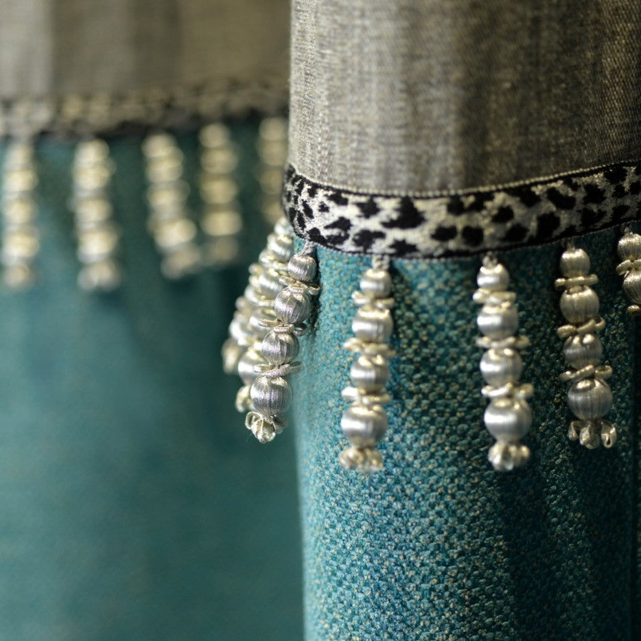 Close up curtain detail with Valenza beaded Drop Fringe in Alabaster Gilt trimmimg