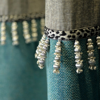 Close up curtain detail with Valenza beaded Drop Fringe in Alabaster Gilt trimmimg