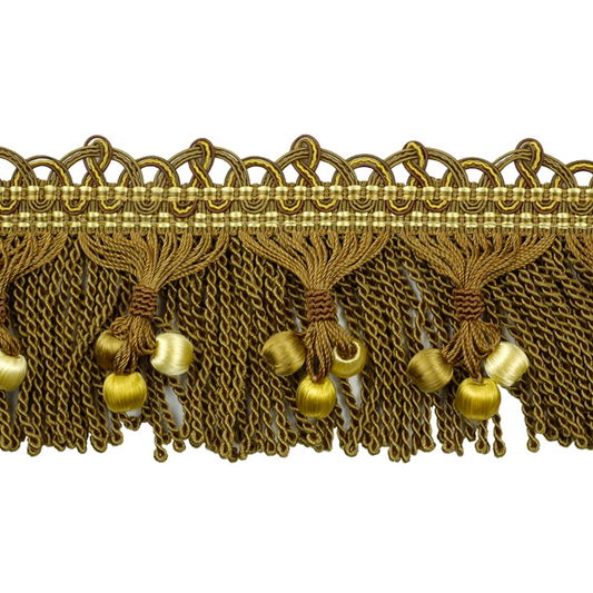Decorative gold fringe with tassels on a white background