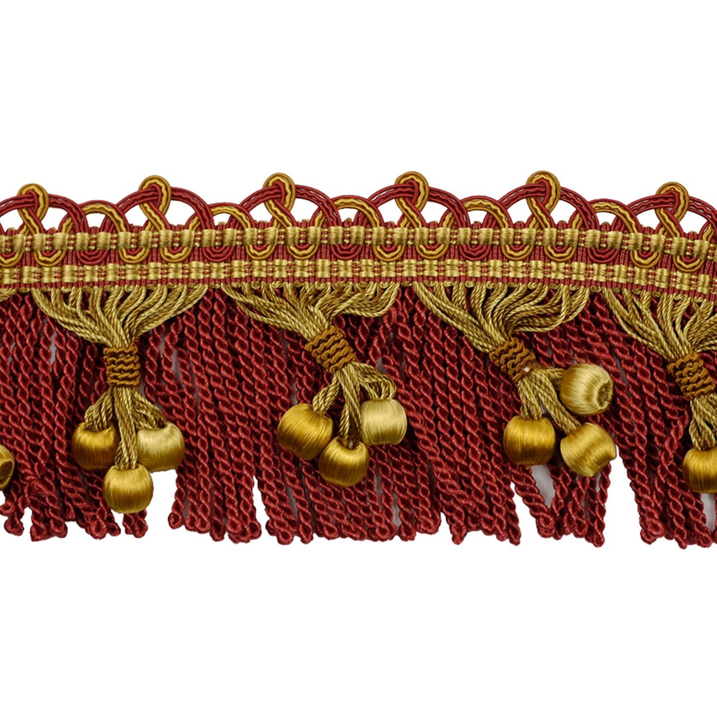 Decorative fringe with gold tassels on a red background