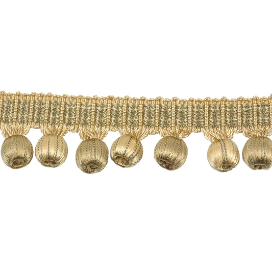 Gold fringe trim with spherical beads on a white background