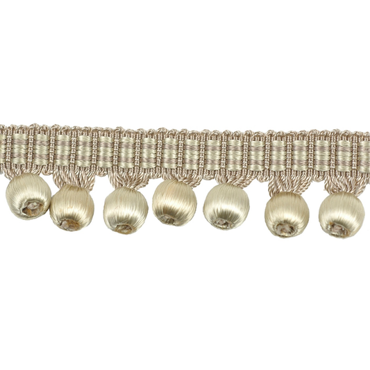 Decorative trim with metallic beads on a white background