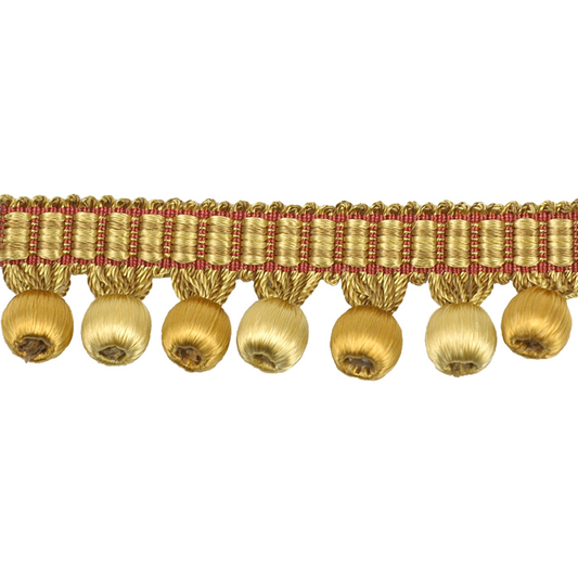 Gold decorative trim with beads on a white background