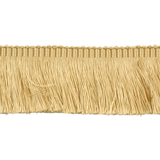 Gold fringe trim on a white background