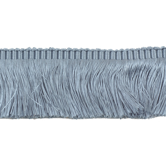 Close-up of blue fringe trim on a white background