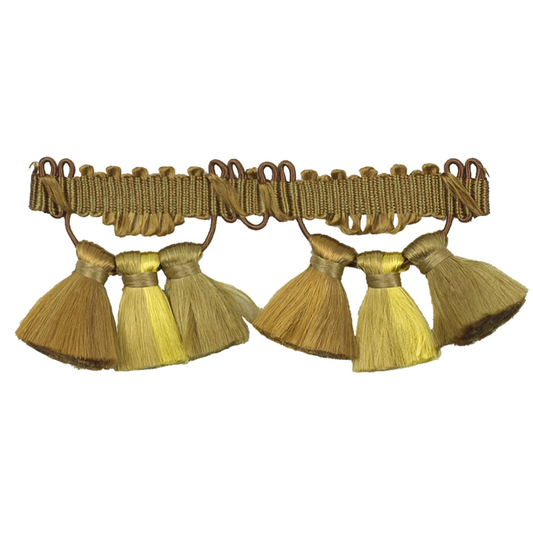 Gold tassel trim on a white background