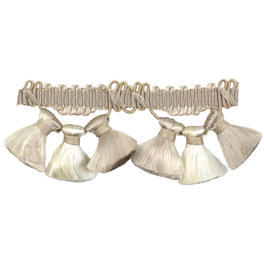 Beige trim with tassels on a white background