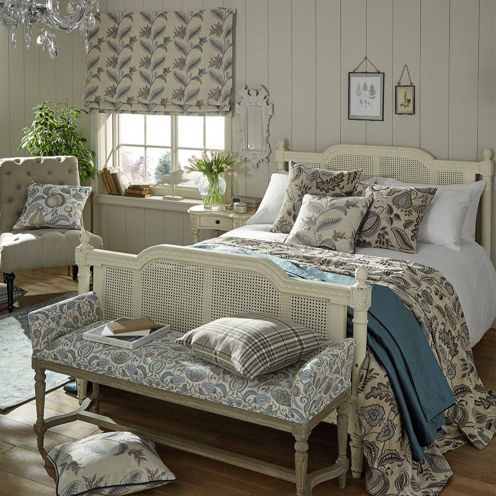 Bedroom décor featuring Arbor Vine Dove fabric on curtains, cushions, and bench upholstery, creating a cohesive arts and crafts aesthetic.