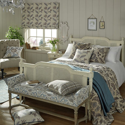 Bedroom décor featuring Arbor Vine Dove fabric on curtains, cushions, and bench upholstery, creating a cohesive arts and crafts aesthetic.